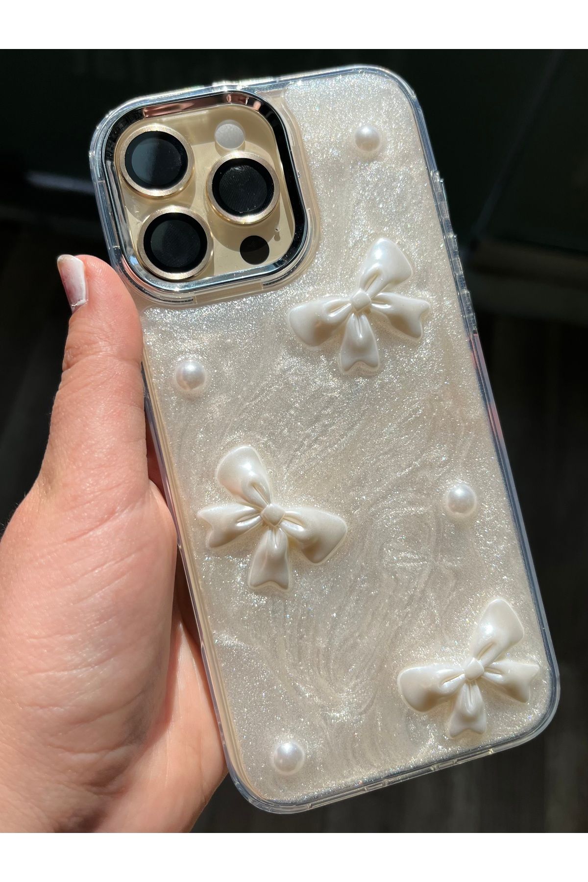 Caseji iPhone 16 Pro Max Uyumlu 3D Kurdele Detaylı Işıldayan Kılıf - Görsel 2