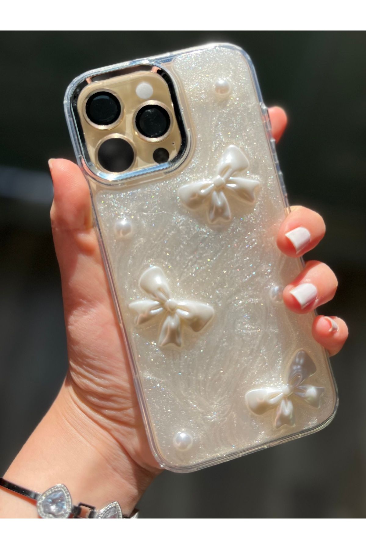 Caseji iPhone 16 Pro Max Uyumlu 3D Kurdele Detaylı Işıldayan Kılıf - Görsel 4