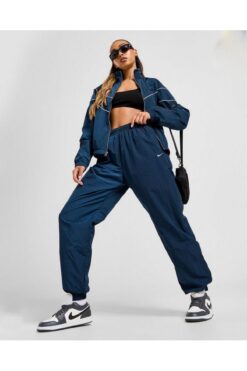 Nike Sportswear Essential Women's Mid-Rise Oversized Woven Joggers NDD SPORT