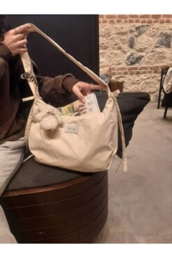 RONASBAG Bow Bag Krem Kadın Astarlı Içi Gözlü Fiyonk Detaylı Fermuarlı Baget Kol Çantası