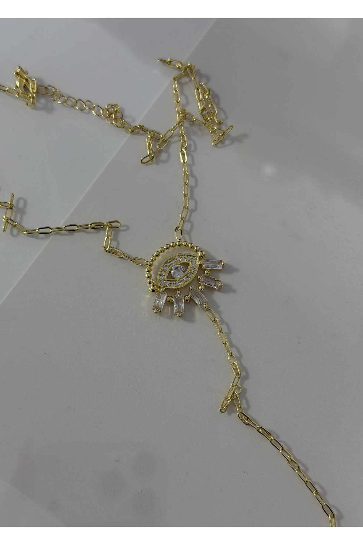 KİLİGİSTANBUL GOLD RENK ZİRKON TAŞLAR GÖZ KOLYE