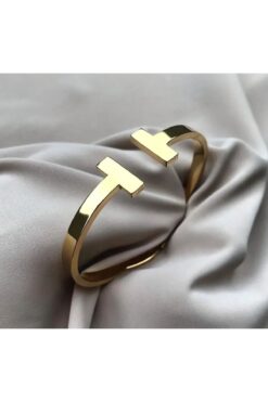 X-Lady Accessories Altın Renk  xoxo  Model T Uçlu Desenli Kelepçe Bileklik