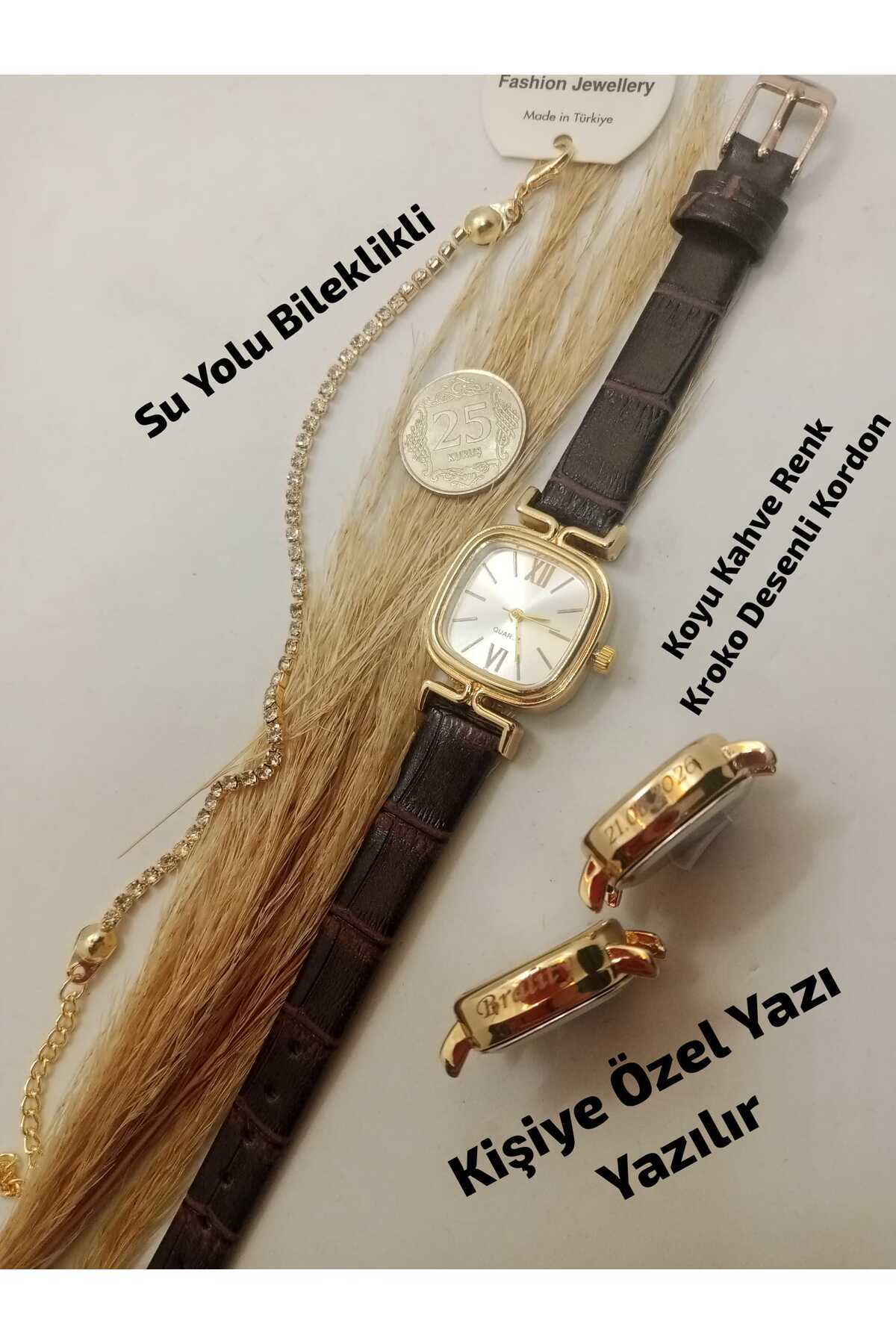 Brality KİŞİYE ÖZEL YAZI YAZILIR - Yeni Moda Kadın Kol Saati ... Retro Minimal , Vintage Model, Koyu Kahve Renk Kordon , Beyaz Renk Roma Rakamlı Kadran , GOLD RENK KASA - SU YOLU BİLEKLİK HEDİYELİ