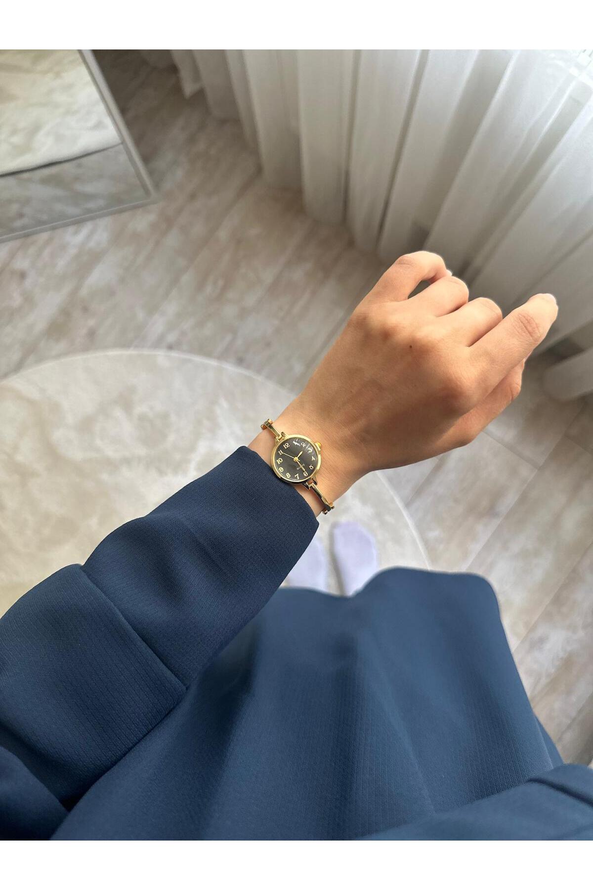 MERW Vanetta Model Gold Siyah Renk Vintage Seri Metal Kordon Kadın Kol Saati